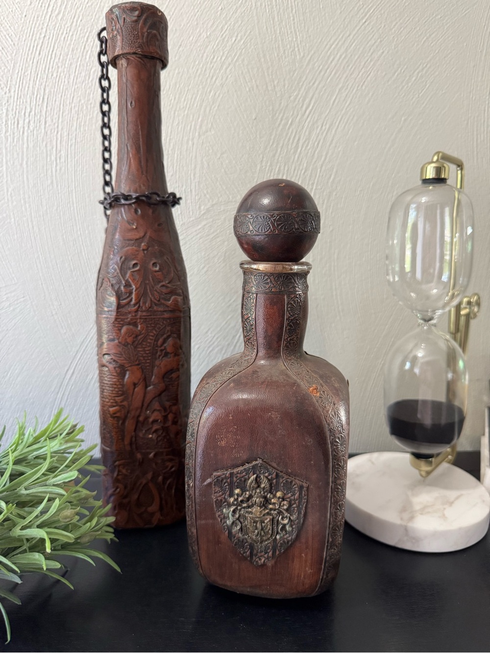 Vintage leather wrapped glass decanters